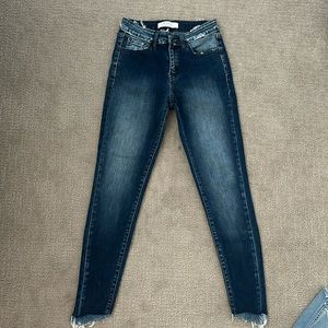 Size 26 Kancan Signature jeans. Dark wash, extreme stretch, frayed hem.